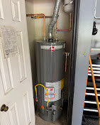 Rheem water heater install — second angle showing copper piping